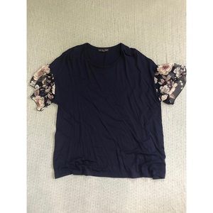 Blue top, floral sleeves